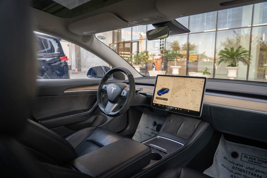 Tesla Model 3 center touchscreen showing the navigation map